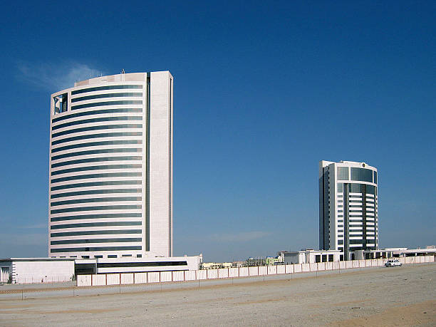 Ashghabat (Turkmenistan) The new ministry for gas and oil, built by Bouygues Company. In the background, the president hotel.