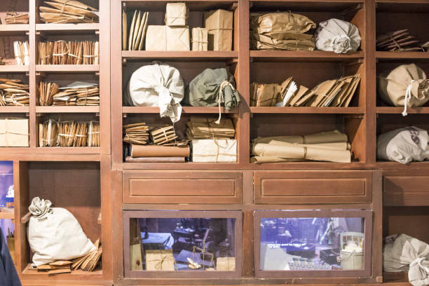 istock Stack of old letters on a wooden bookcase. Old mail of the post office 1158713530