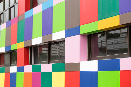 Multi-colored windows of the school in a contemporary style. Architecture