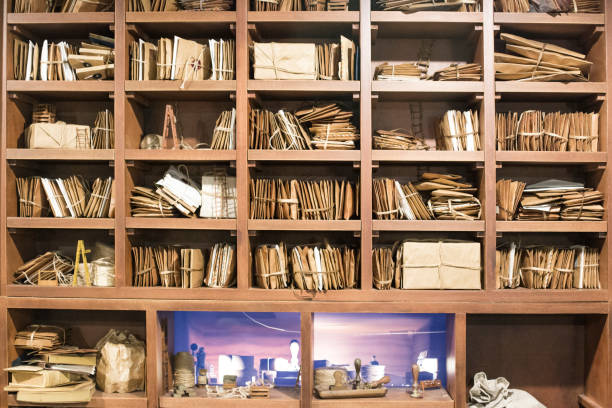 istock Stack of old letters on a wooden bookcase. Old mail of the post office 1158713559