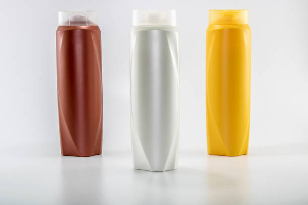 istock Shampoo, moisturizing bottles in brown, white, yellow colors. 1158713572