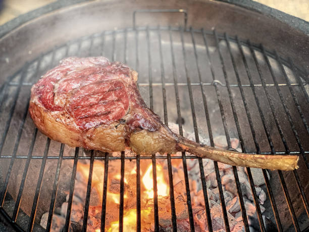 Wagyu Tomahawk steak on the hot bbq grill