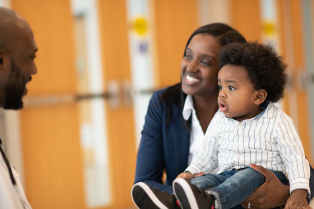 istock Baby with mother at routine medical appointment 1158716421