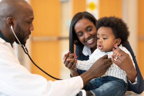 istock Baby with mother at routine medical appointment 1158716428