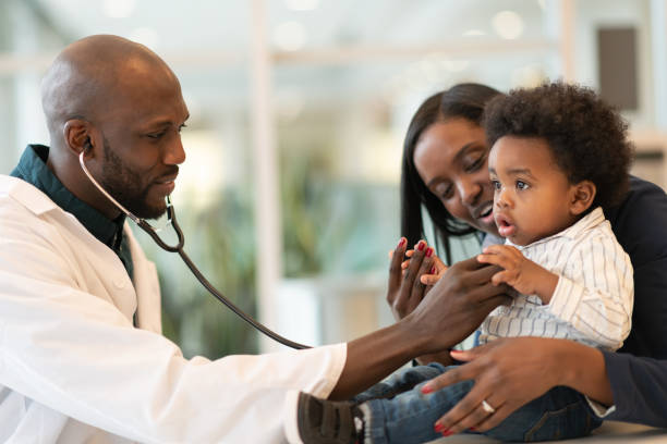 istock Baby with mother at routine medical appointment 1158716635