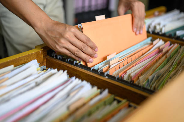 istock Employees are managing documents at the office. 1158717976