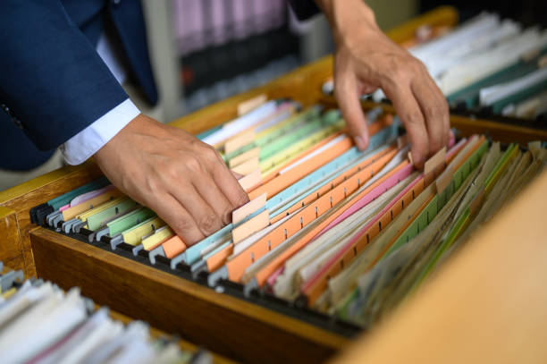 istock Employees are managing documents at the office. 1158718020