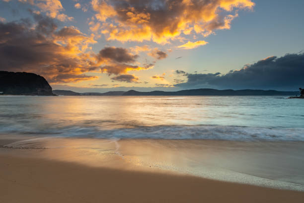 istock Early Morning Beach and Seascape with Clouds 1158721109