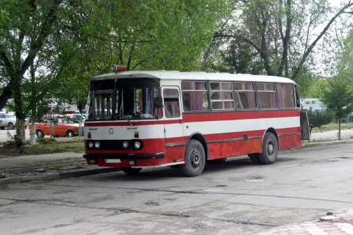 Avellaneda, Argentina - May 7, 2023: Old blue 1972 Mercedes Benz 911 bus for public passenger transport in Buenos Aires at a classic car show in a park. Traditional fileteado ornaments.