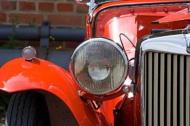 Photo of Vintage MG Closeup of Headlight, Wing and Grille