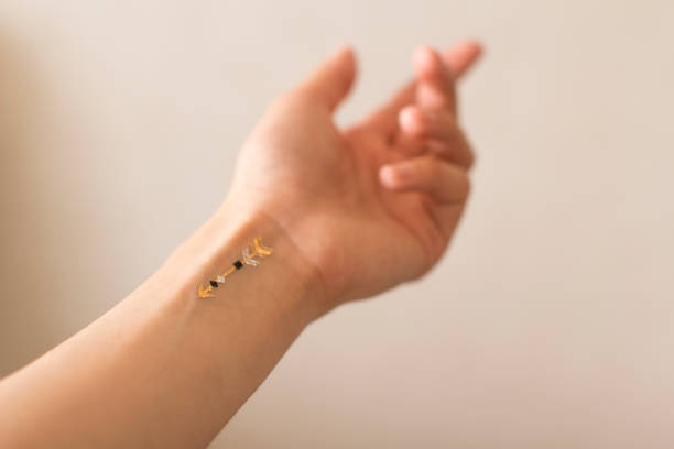 istock young woman's hand with temporary tattoo 1158727949