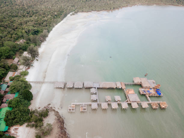 istock Aerial Photos over Huts on Island Resort 1158728020