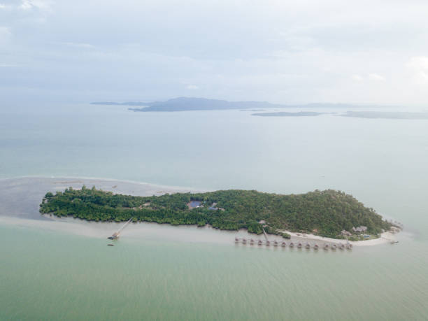 istock Aerial Photos over Huts on Island Resort 1158728047