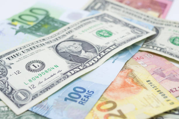 istock Dollar, Euro and Brazilian Real notes grouped 1158734364