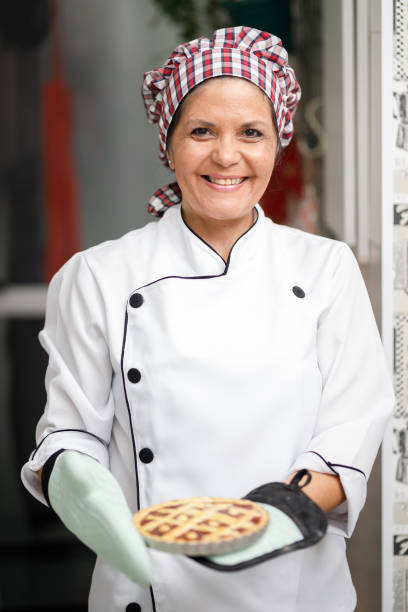 istock Patissier - Confectioner preparing sweets 1158735095