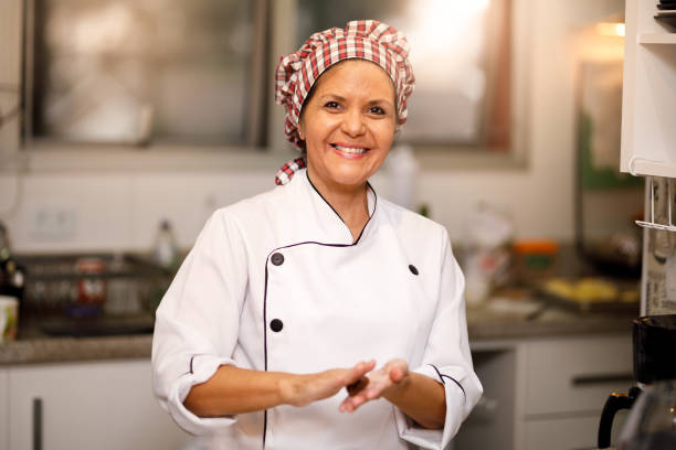 istock Confectioner preparing chocolate sweet - brigadeiro 1158735100