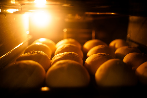 breads baking in the oven.