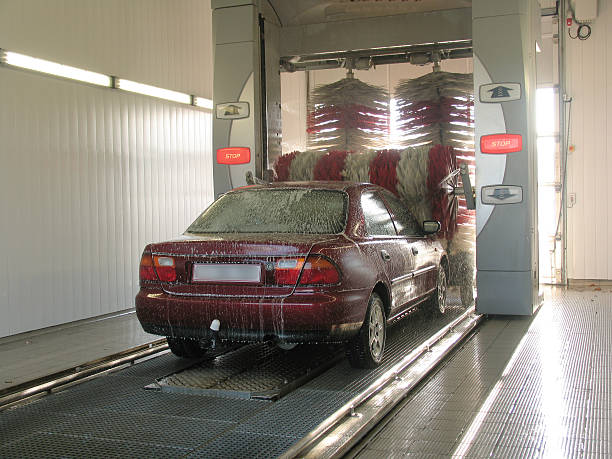 istock Red sedan going through the car wash 115873930