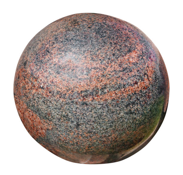 Stone polished red granite ball like planet Earth isolated on white