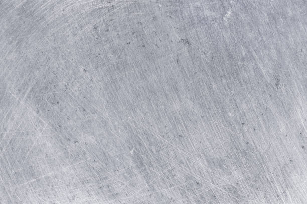 istock aluminium texture background, scratches on stainless steel. 1158740479