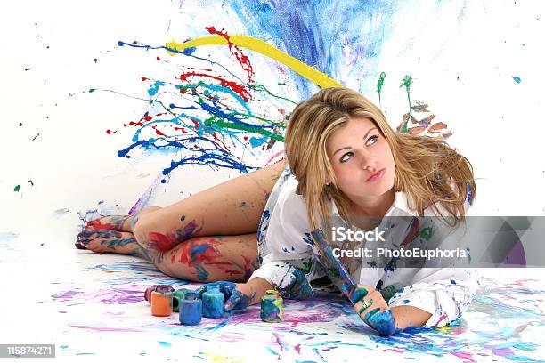 Beautiful Young Woman Painting In A White Room Stock Photo - Download Image Now - Paint, Artist's Canvas, Covering