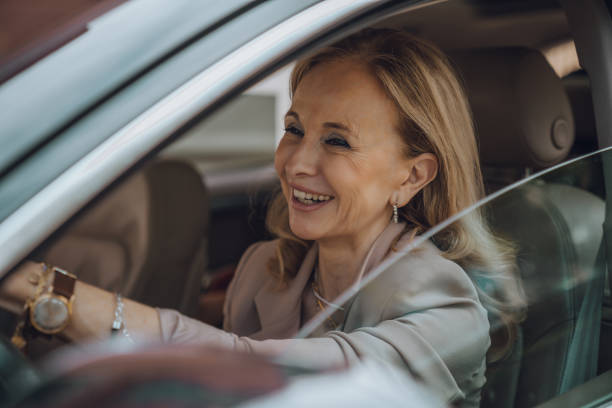 istock Senior female driving 1158745650