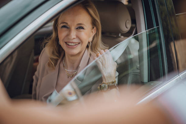 istock Senior female driving 1158746249
