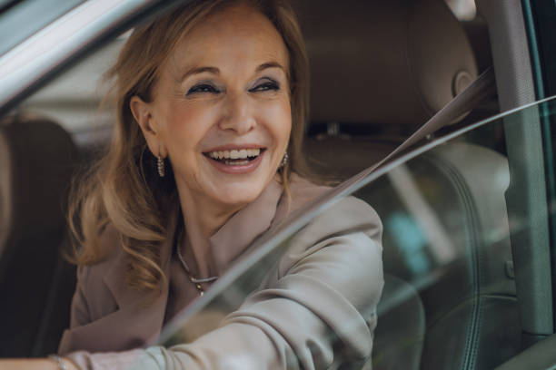 istock Senior female driving 1158746252
