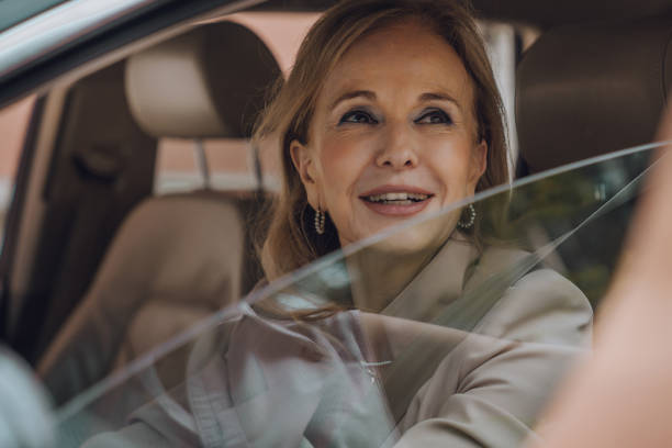 istock Senior female driving 1158746277
