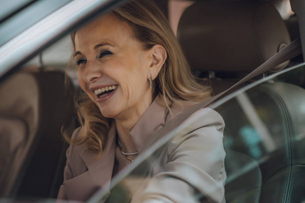 istock Senior female driving 1158746434