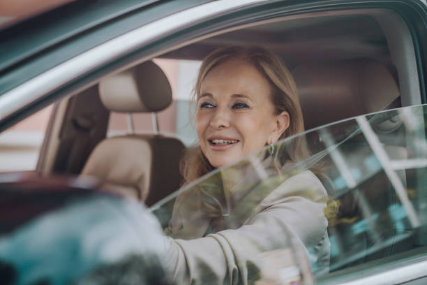 istock Senior female driving 1158746490