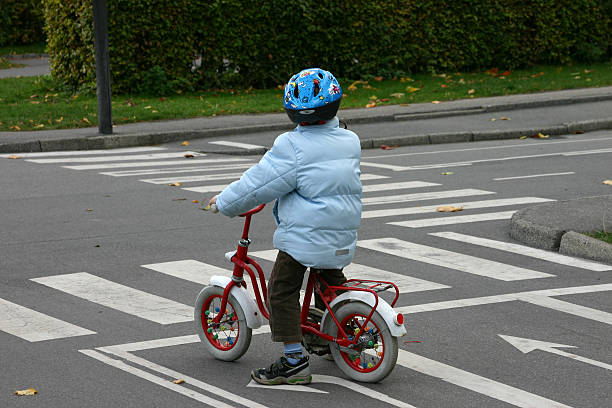 istock Boy riding on a bike 115874717