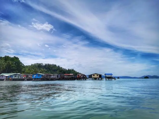 Borneo sea gypsy water village or house on stilts view in Gaya island, Kota Kinabalu. Sabah, Malaysia. Borneo.