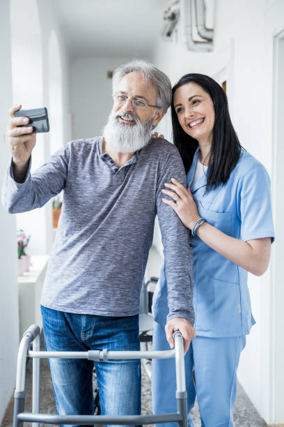 istock Nurse doing selfie with senior patient 1158754088