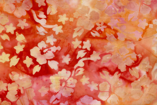 Indonesian batik fabric with hibiscus pattern.