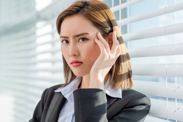 istock business woman afraid of suntan 1158756064