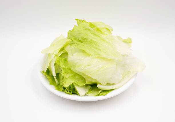 istock Green iceberg lettuce for consumption 1158757173