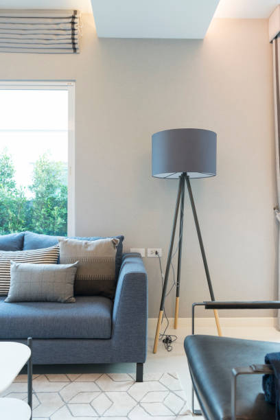 istock Modern and stylish living room, blue sofa and grey pillow. 1158757692