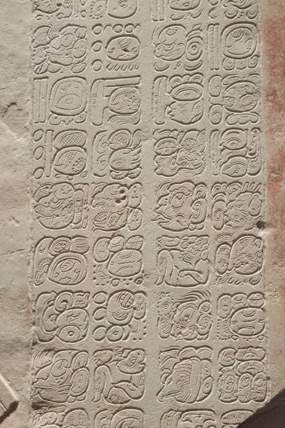 istock Base relief stone carving with Mayan inscription. 1158760348