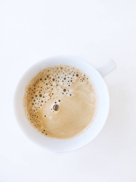 istock Hot coffee on white table, top view photo 1158763737