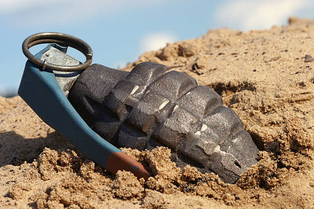 Grenade in Dirt grenade in the dirt hand grenade photos stock pictures, royalty-free photos & images