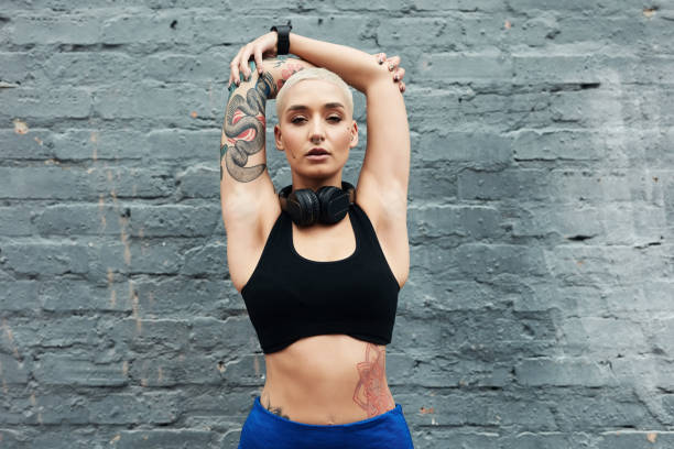 istock Making sure to stretch my arms 1158773951