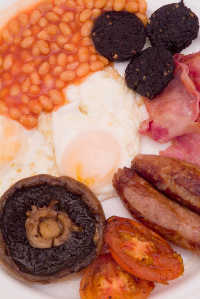 istock Eggs beans sausage and mushroom english breakfast 115877433