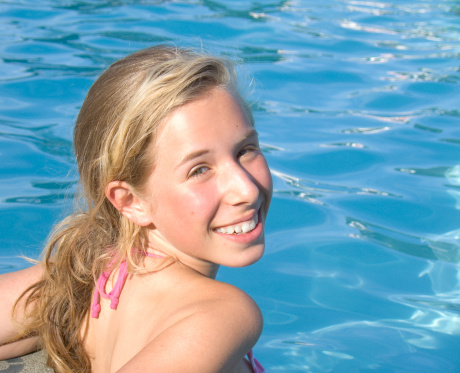 Pretty girl in swimming pool