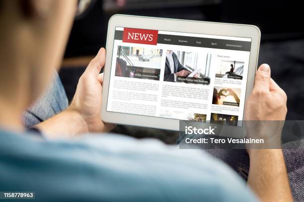 Online News Article On Tablet Screen Electronic Newspaper Or Magazine Latest Daily Press And Media Mockup Of Digital Portal And Website Happy Person Using Web Service In The Morning Stock Photo - Download Image Now