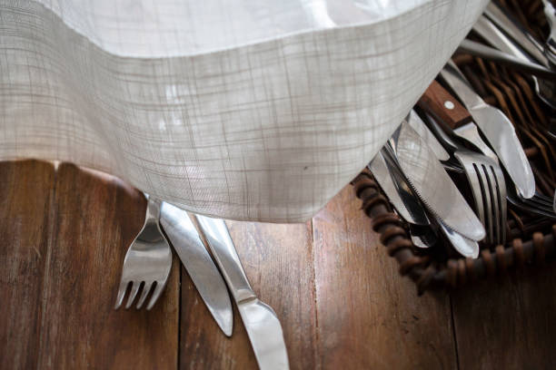 istock forks and table knives in basket 1158781857