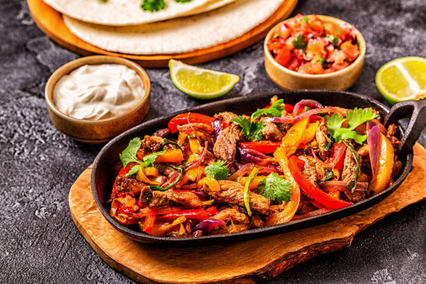 istock FAJITAS with colored pepper and onions 1158782161