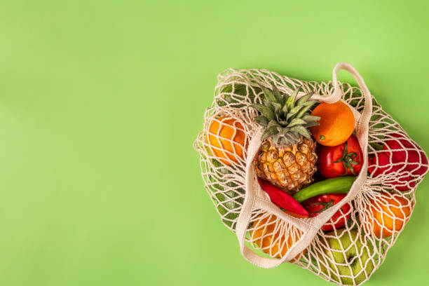 istock Fresh vegetables and fruits in bag mesh 1158782907