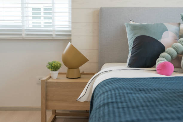 istock modern kid's bedroom interior with green, blue pillows 1158784338
