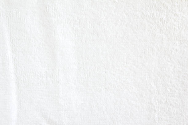 istock White crumpled soft terry towel texture background. 1158785192